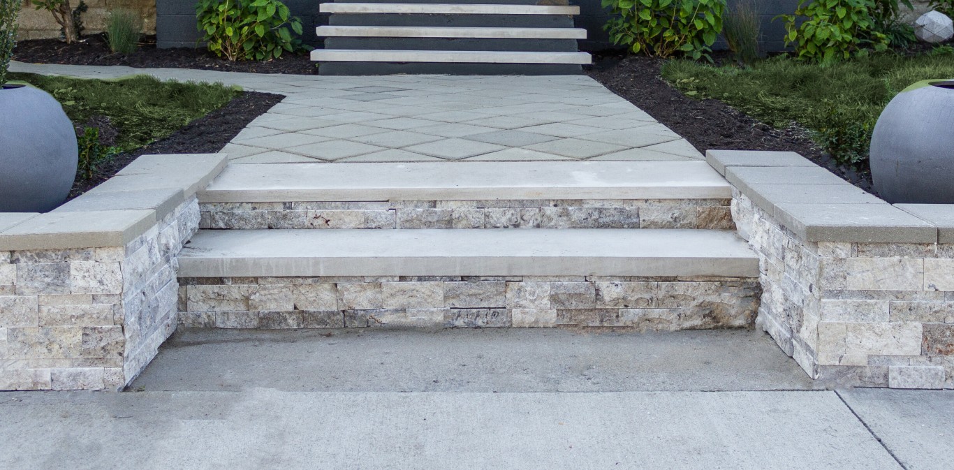 Elegant concrete steps with decorative stone masonry in Fond du Lac